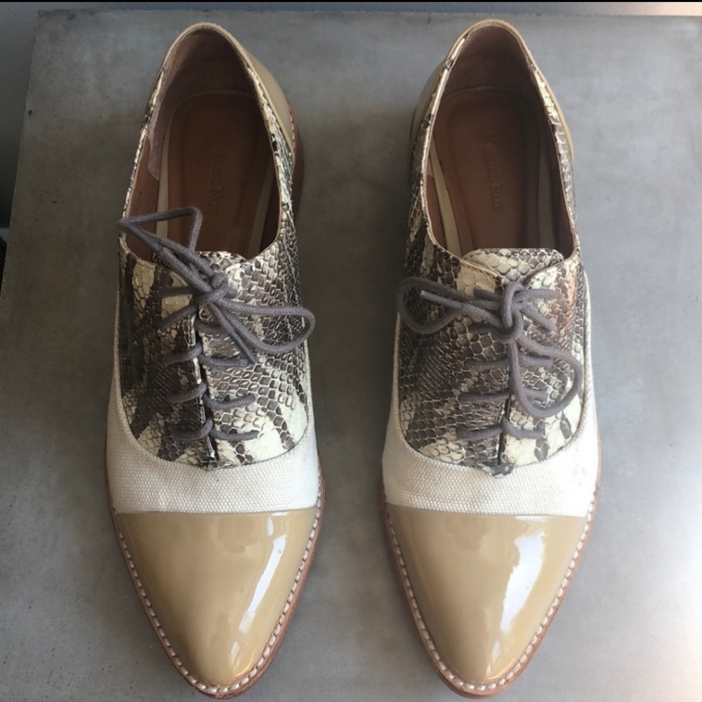 Rachel Roy mixed media laced up oxfords.